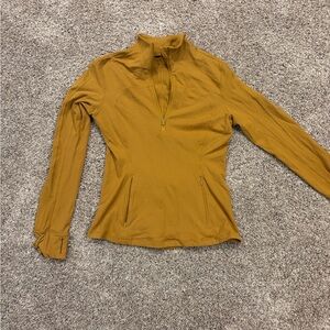 Lululemon Athletica Golden Long Sleeve 1/4 zip